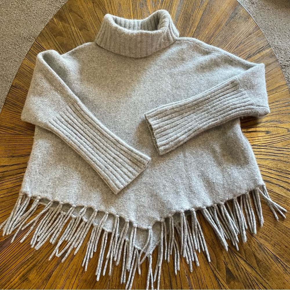 Elegant Gray Turtleneck Sweater with Fringe